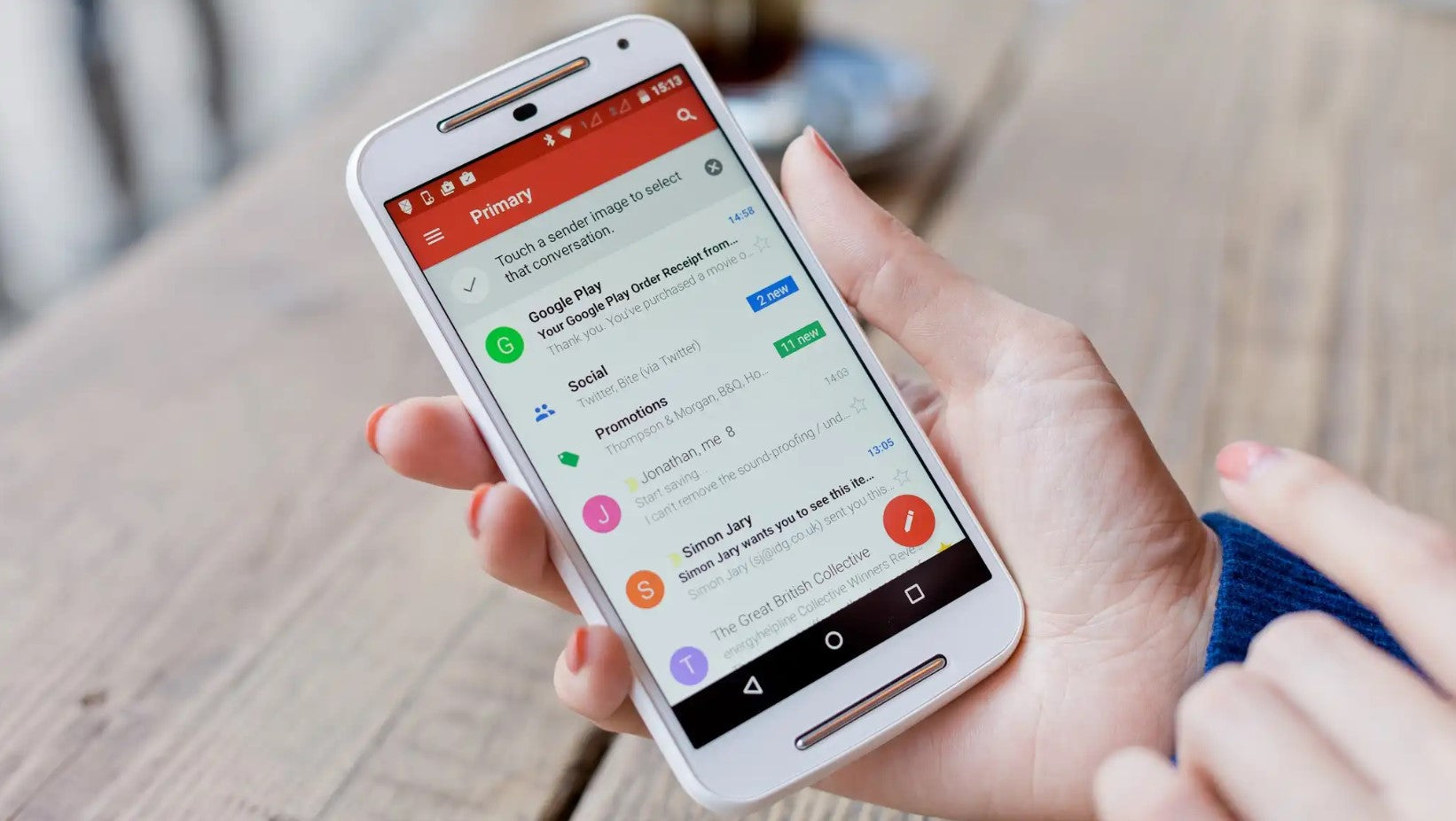 White_Woman_Holding_Smartphone_Reading_E-mails